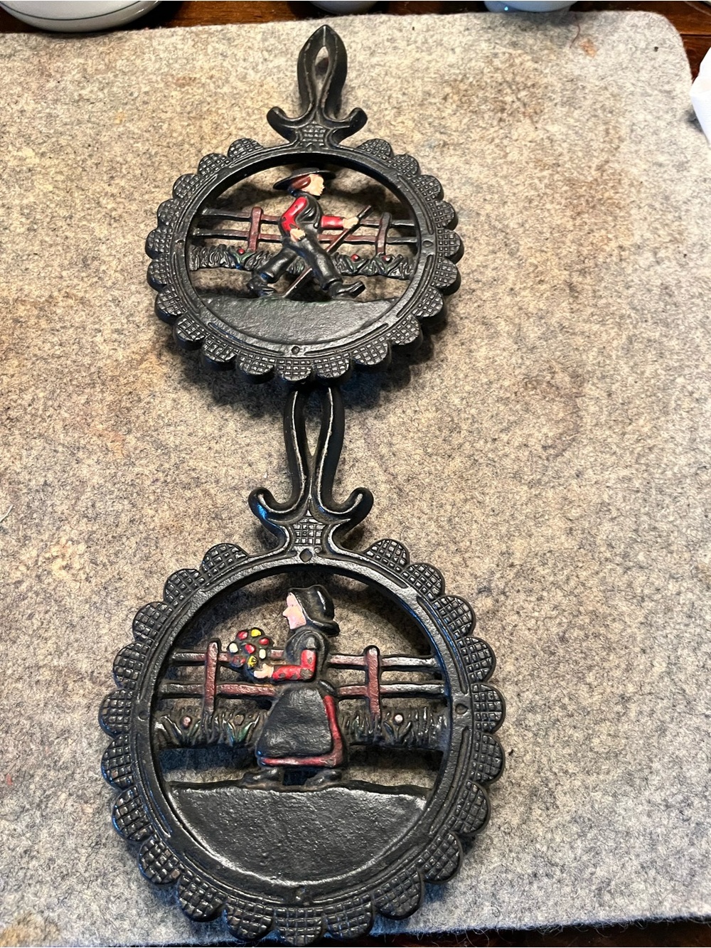 Vintage Style Black Cast Iron Double Trivet with Amish figures Scene